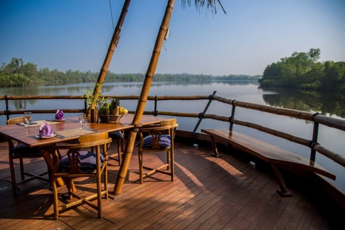 Relaxation by Bentota River by Dinuka Lankaloka